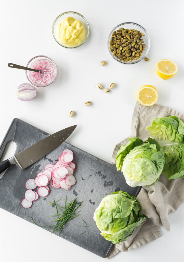 wedge salad with herb pistachio dressing, radishes and butter lettuce