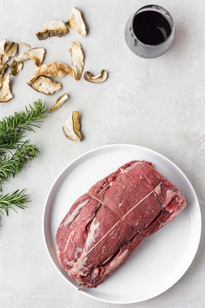 holiday roast with porcini rosemary black pepper crust