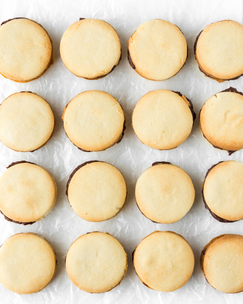 butter cookie sandwiches with chocolate hazelnut ganache