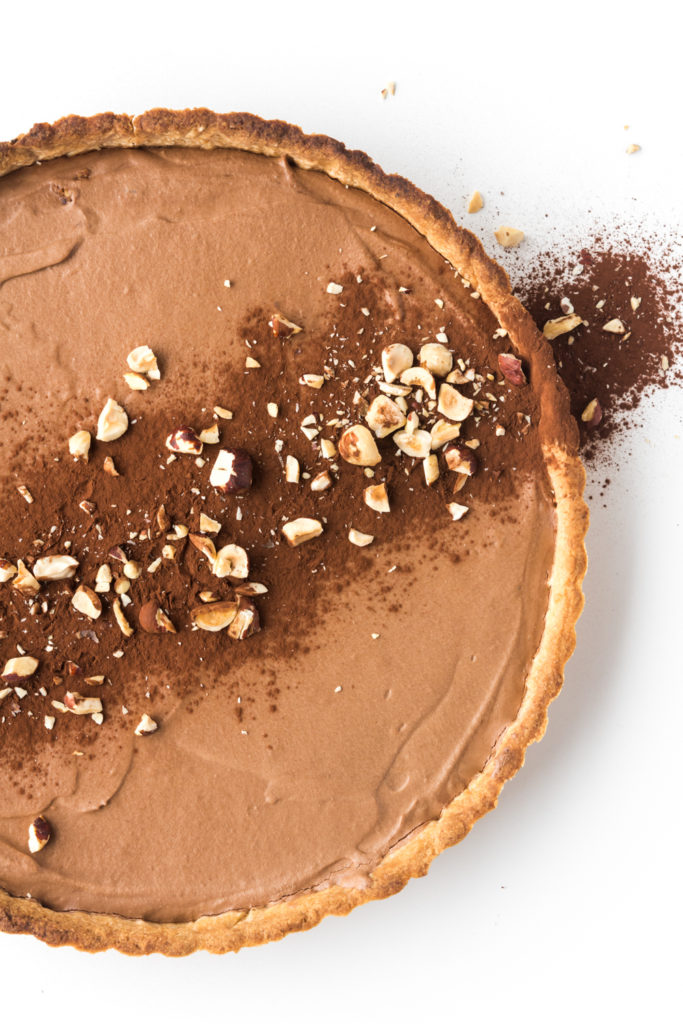 chocolate mousse tart with roasted hazelnut crust