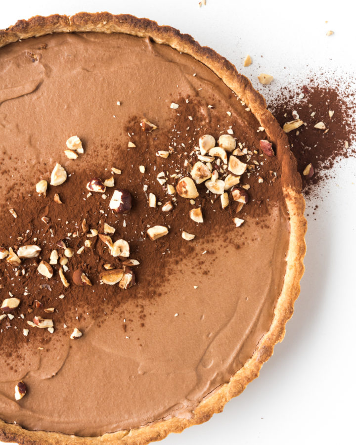 chocolate mousse tart with roasted hazelnut crust