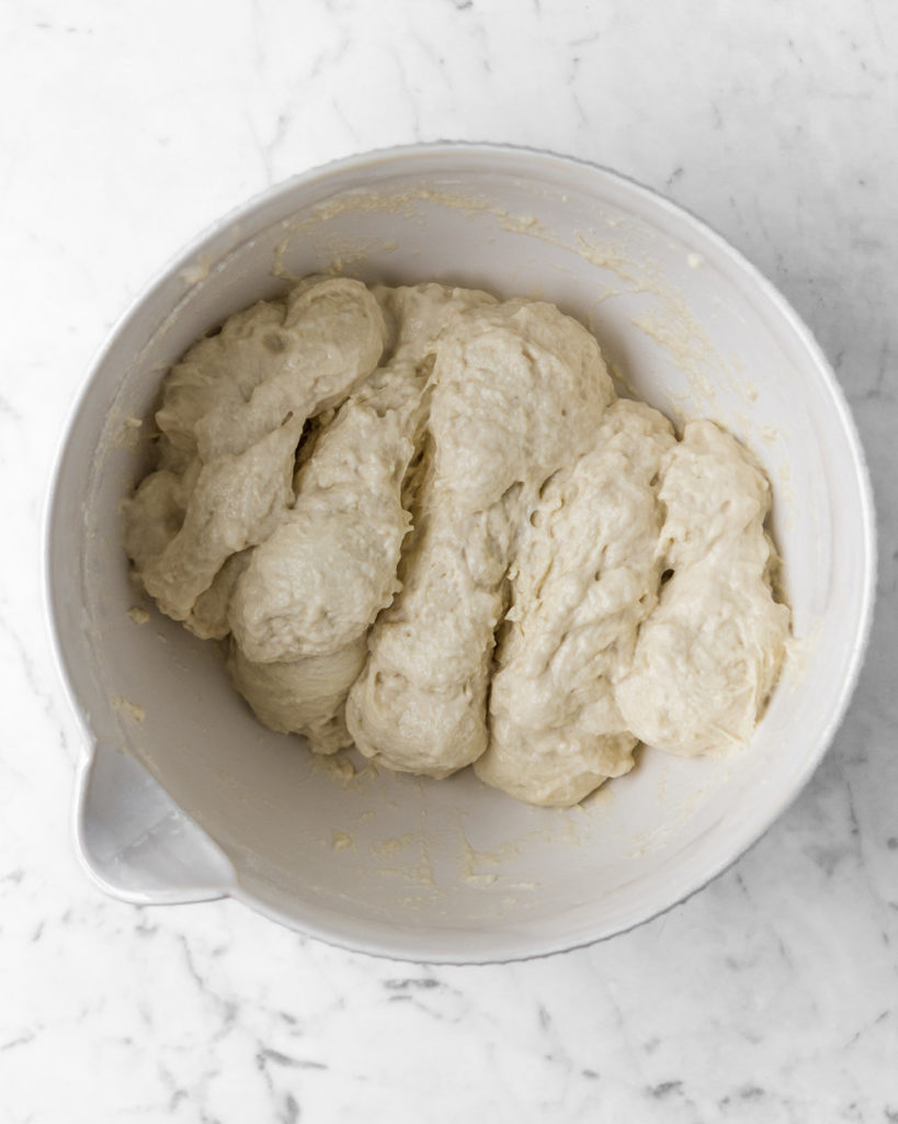 mixing preferment into bread dough