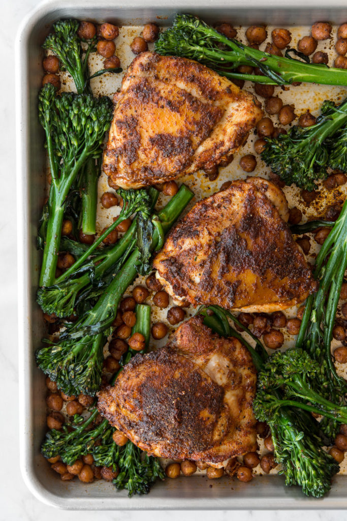 sheet pan chicken thighs with harissa, broccolini and chickpeas