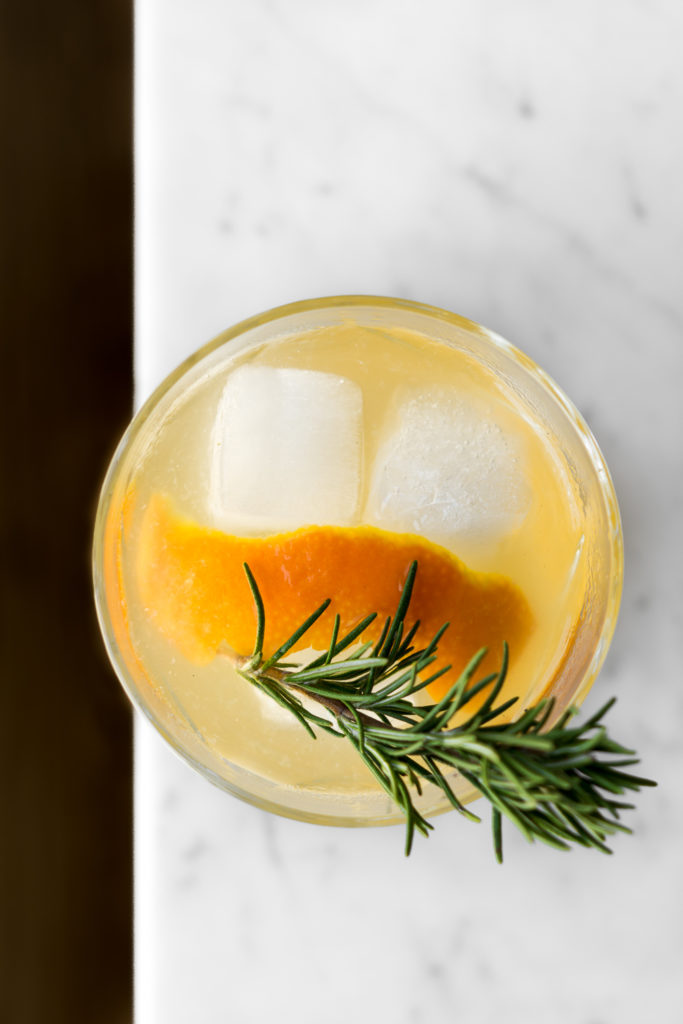 how to make a shrub cocktail with gin, citrus and rosemary oleosaccharum