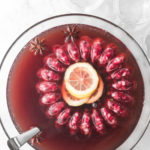 holiday whiskey punch with cherries and champagne