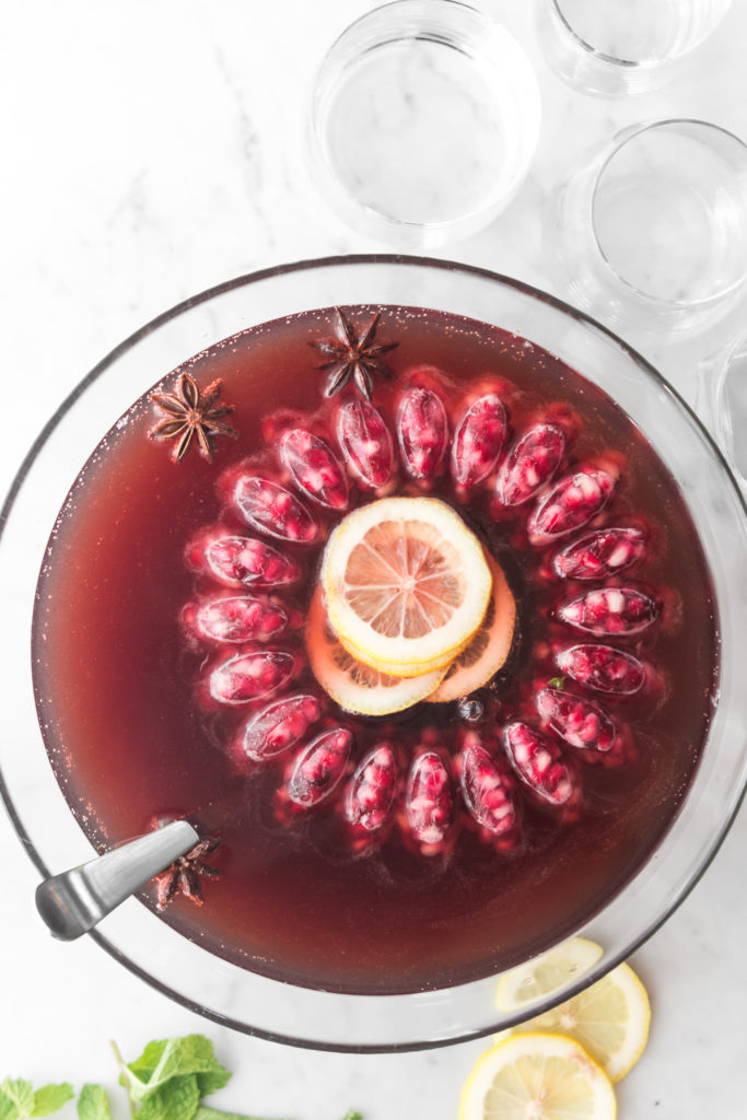 holiday whiskey punch with cherries and champagne