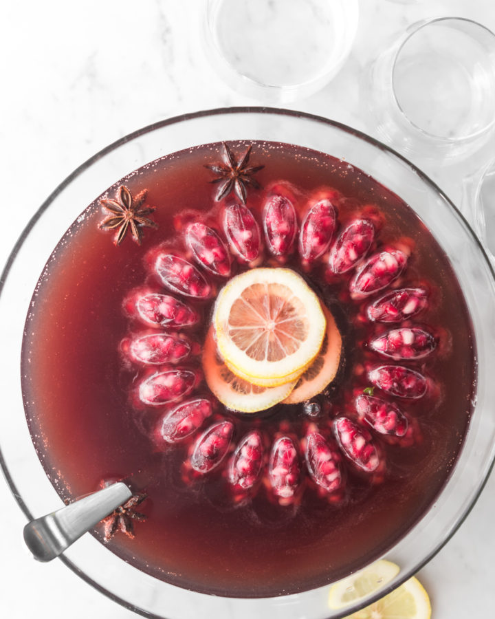 holiday whiskey punch with cherries and champagne