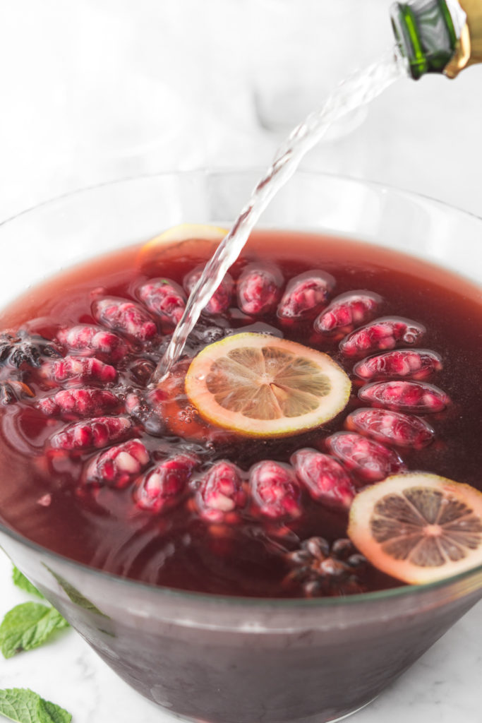 how to make holiday whiskey punch with cherries and champagne