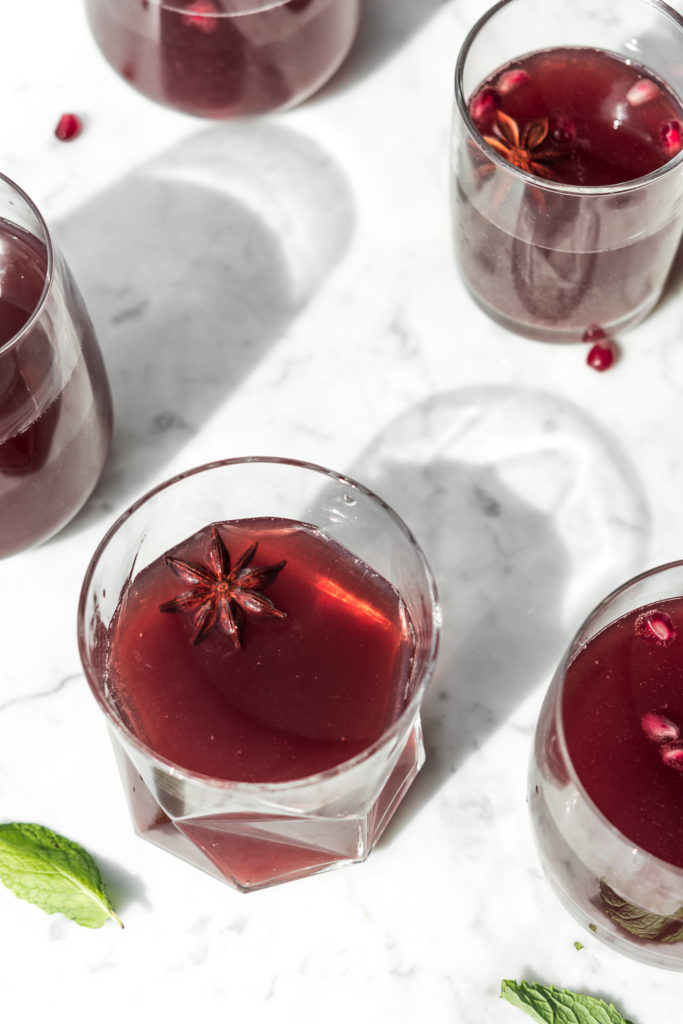 rye whiskey punch with sour cherries, spiced simple syrup, lemon juice and champagne