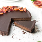 double chocolate tart with candied orange slices