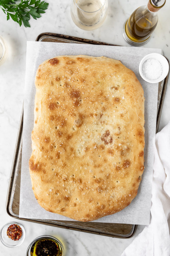 baked focaccia stuffed with cheese and pistachio parsley pesto