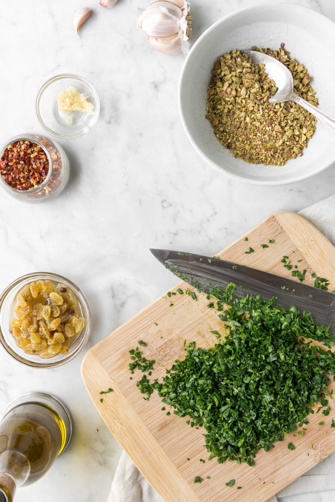 parsley, pistachios, golden raisins, red pepper flakes, garlic, olive oil