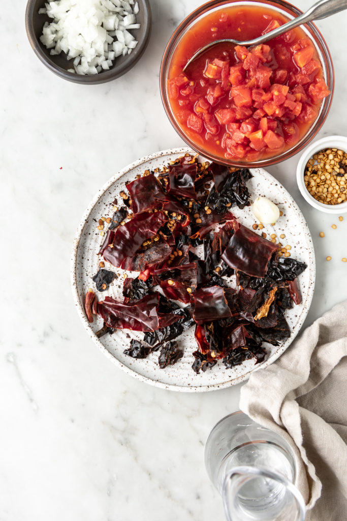 dried red chiles, tomatoes, onions, garlic, water