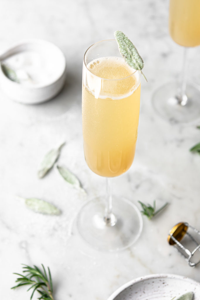 pear bellini with honey and crystallized sage leaves