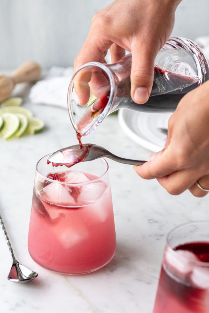 red wine float on blackberry tequila spritzer