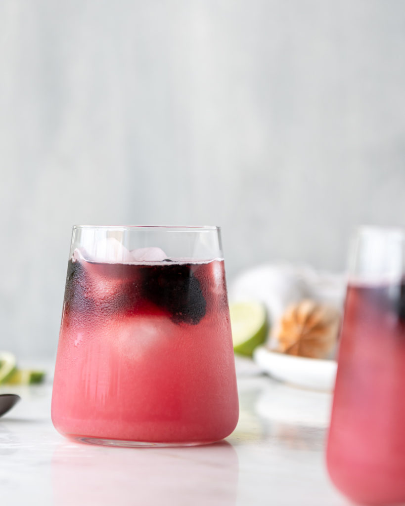 tequila spritzer with blackberry syrup and red wine float