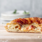 chewy pizza dough recipe with big bubbles in crust