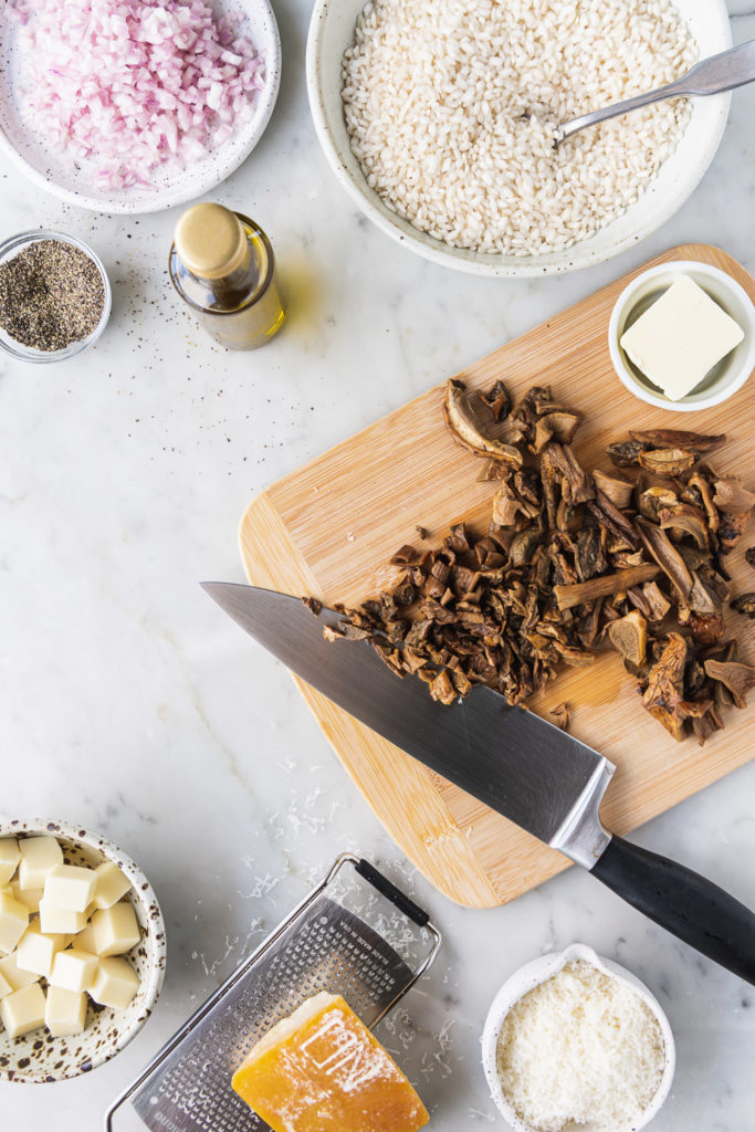 dried porcini mushrooms, arborio rice, truffle oil, shallots, mozzarella, parmesan cheese, butter