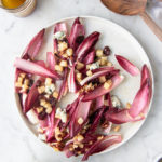 pear endive salad with blue cheese, dried cherries, pecans and maple walnut dressing