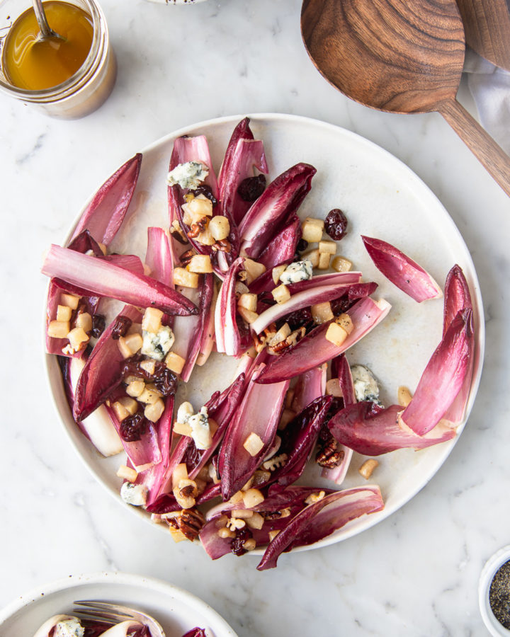 pear endive salad with blue cheese, dried cherries, pecans and maple walnut dressing