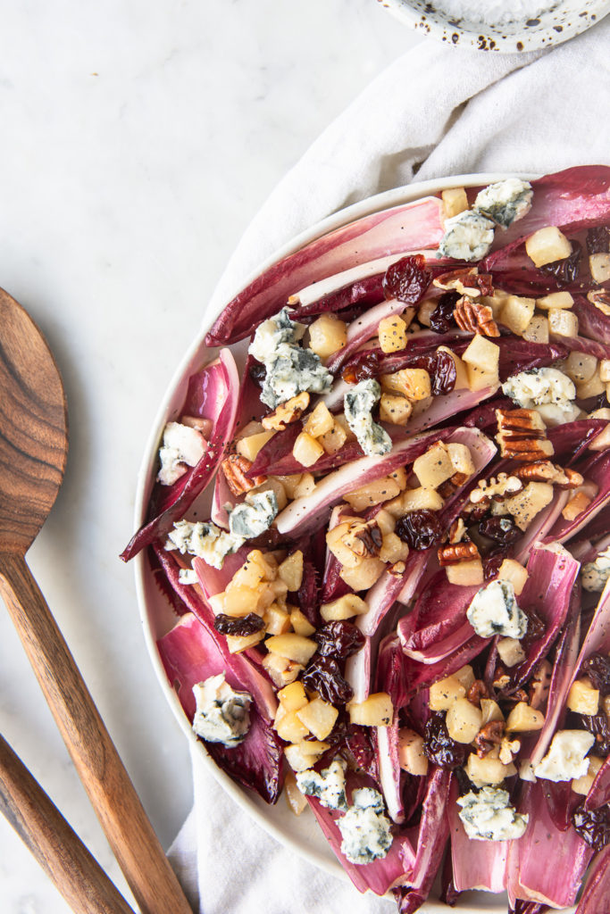 roasted pear salad with red endive, blue cheese, pecans and dried cherries