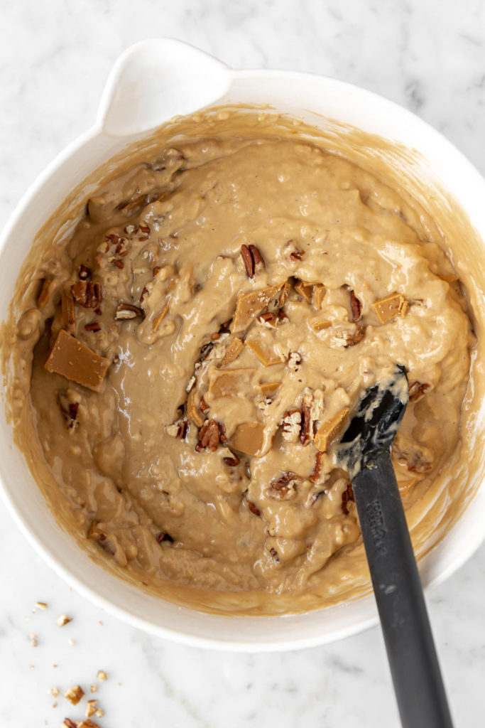 espresso muffin batter with pecans and caramelized white chocolate