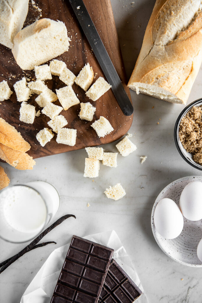 french bread, dark chocolate, eggs, brown sugar, vanilla beans, heavy cream