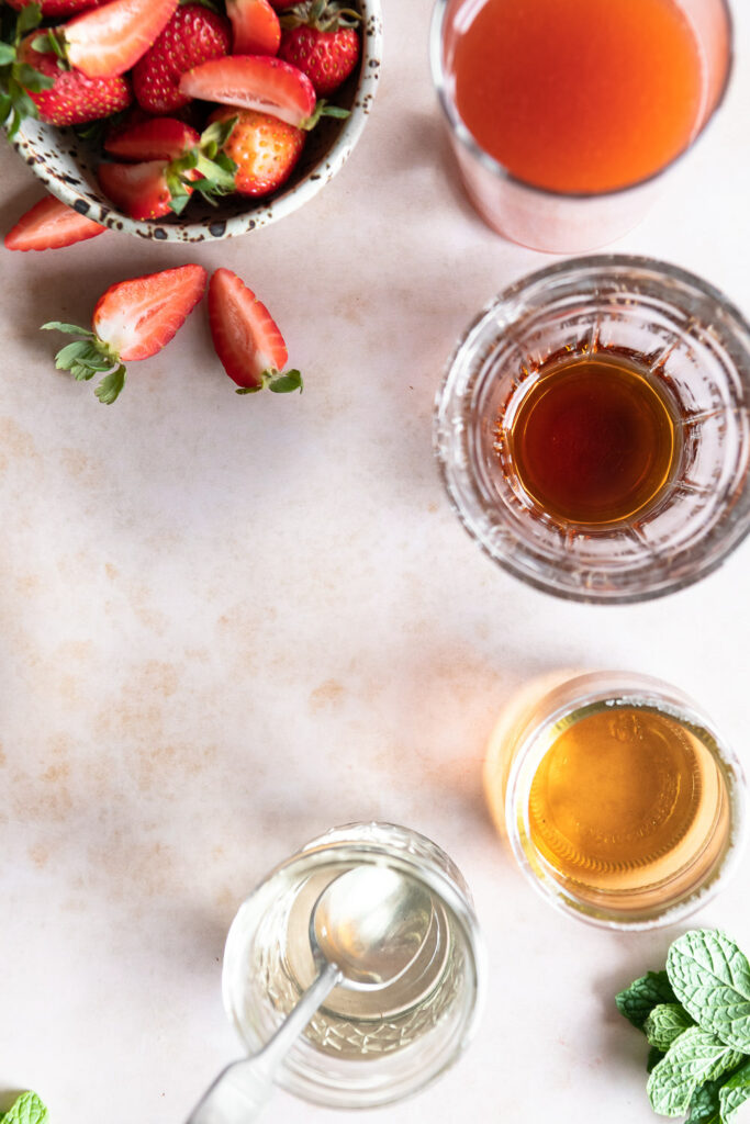 strawberries, rum, amaretto, simple syrup, fresh mint