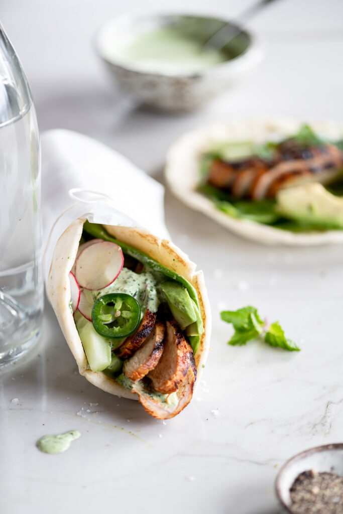 grilled chicken pitas with jalapenos, avocado, cucumber and radishes