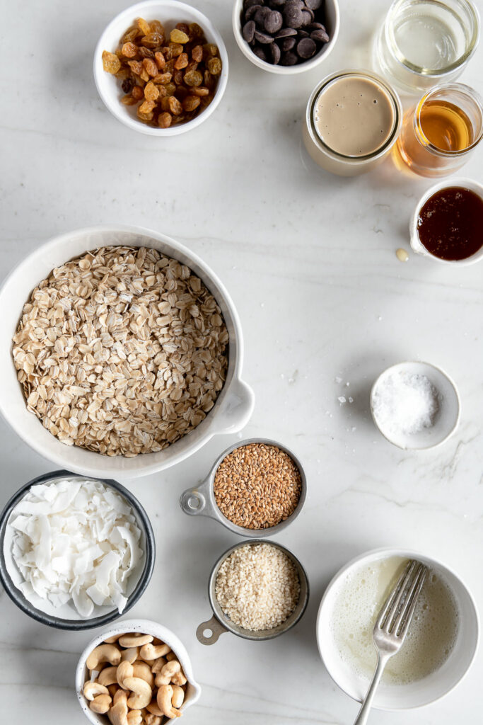 oats, tahini, coconut, sesame oil, sesame seeds, raisins, chocolate, flax seeds, egg white