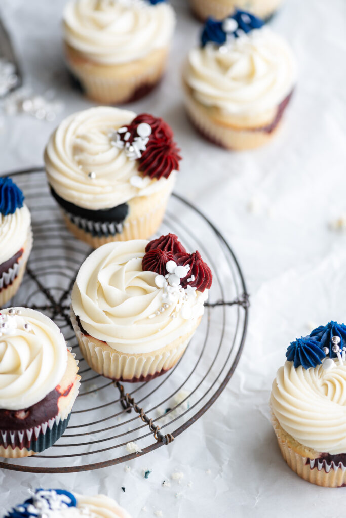 4th of july cupcakes with red and blue velvet swirls