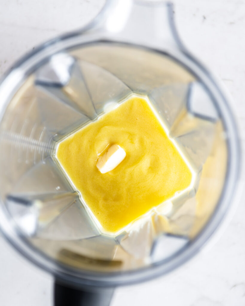 adding butter to lemon curd