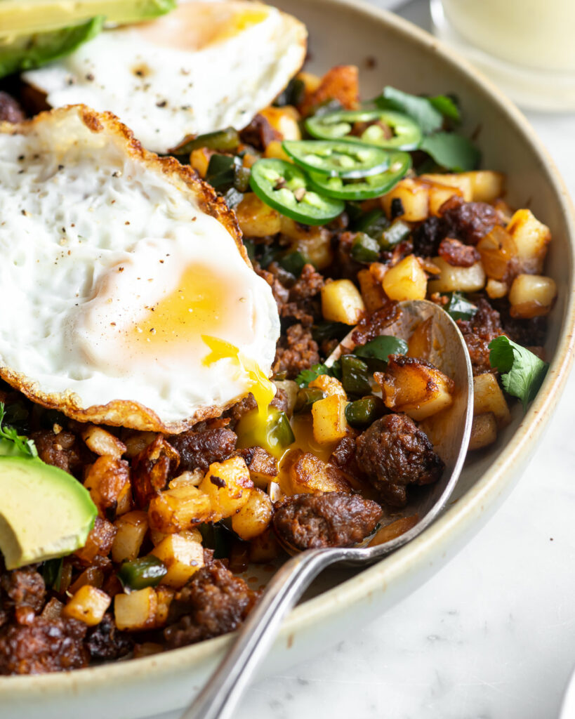 chorizo breakfast hash with poblanos and roasted jalapeno hollandaise