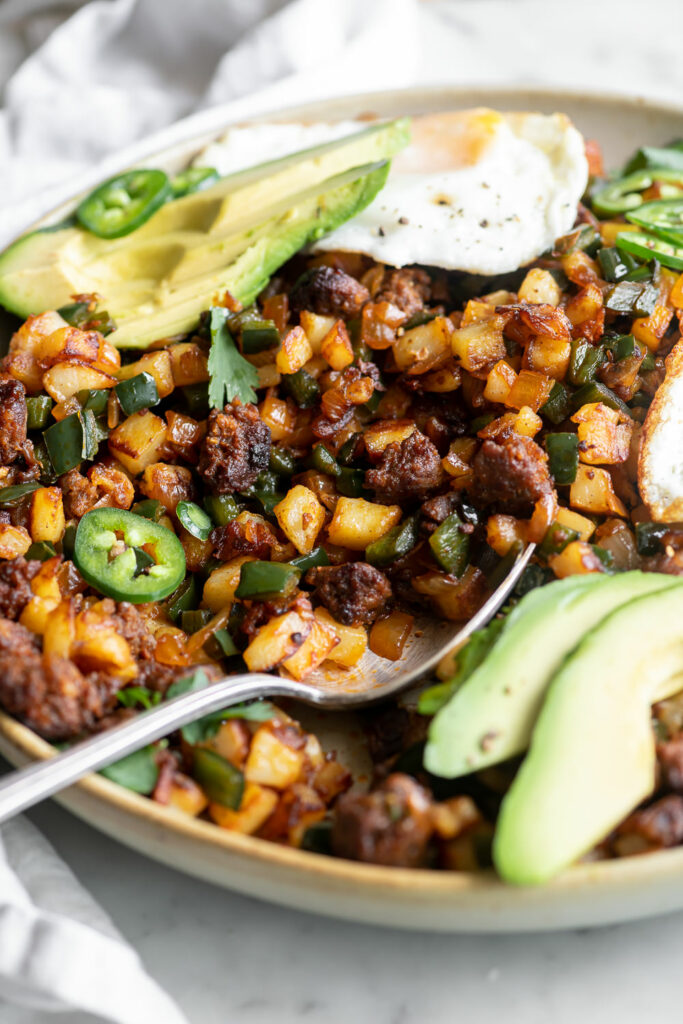 chorizo potato hash recipe with poblanos and roasted jalapeno hollandaise