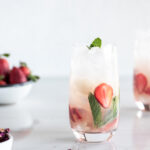 lychee mojito with strawberries and rose