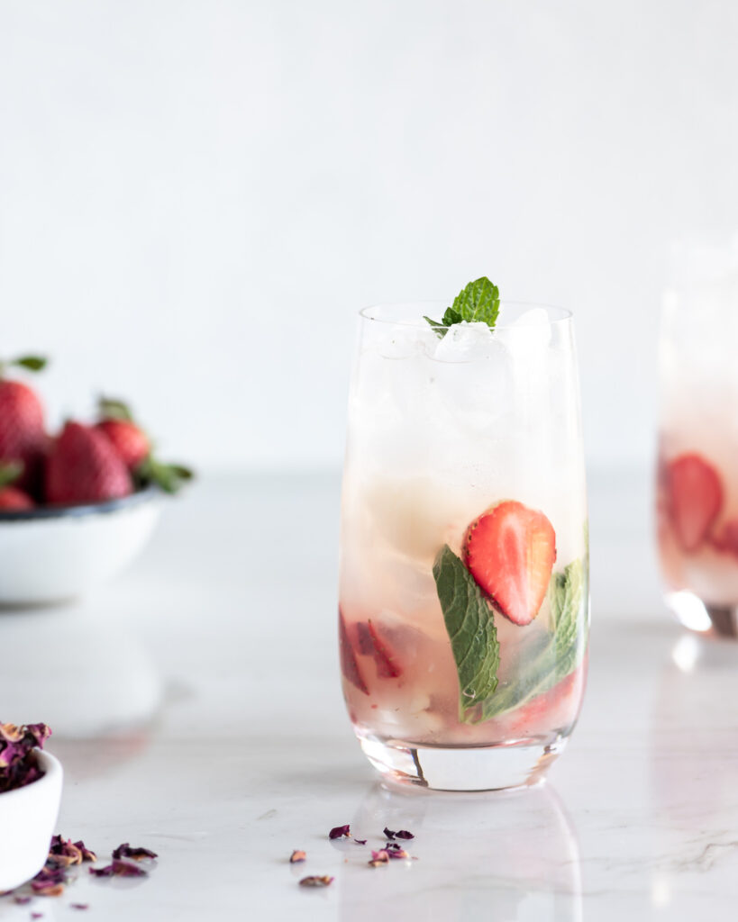 lychee mojito with strawberries and rose