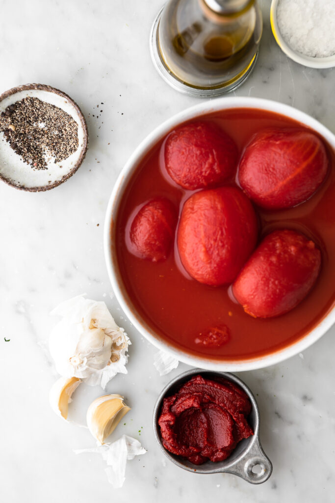 canned tomatoes, tomato paste, garlic, olive oil