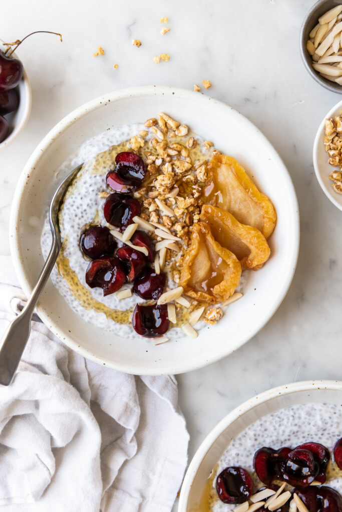 chia breakfast bowl with yogurt and cherries