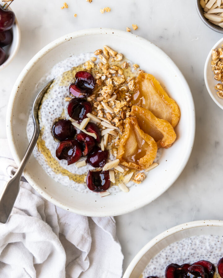 chia breakfast bowl with yogurt and cherries