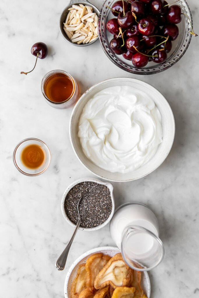 greek yogurt, chia seeds, almond milk, cherries, vanilla, salt, maple syrup, dried pears