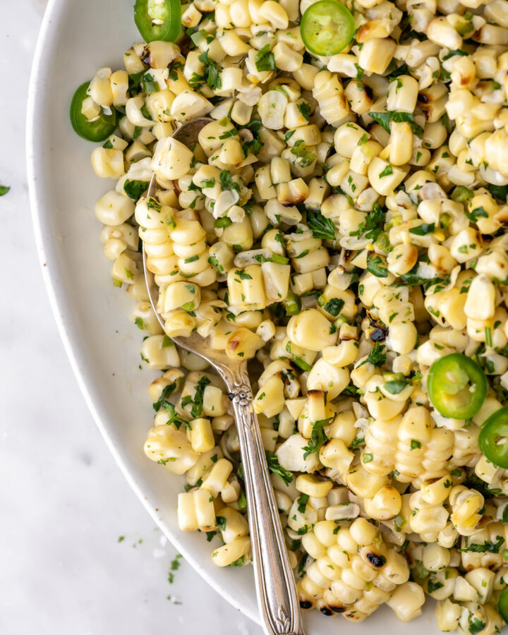 grilled corn salad with serrano peppers and herbs