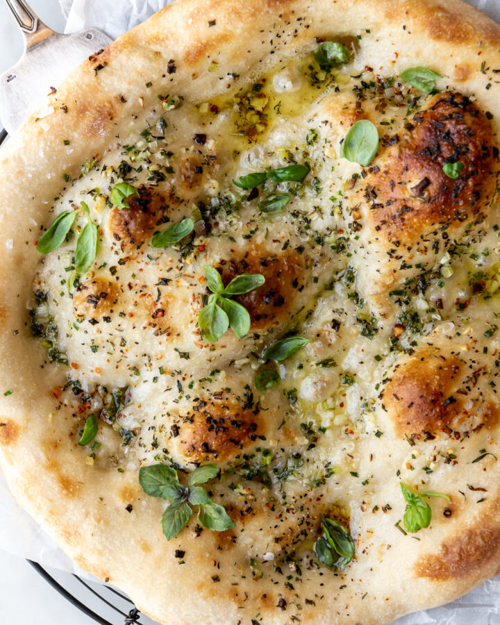 garlic pizza with fresh herbs