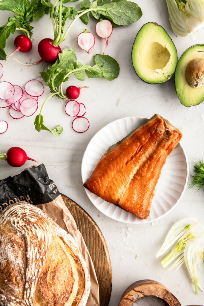 cold smoked salmon, bread for toast, avocado, fennel, radishes