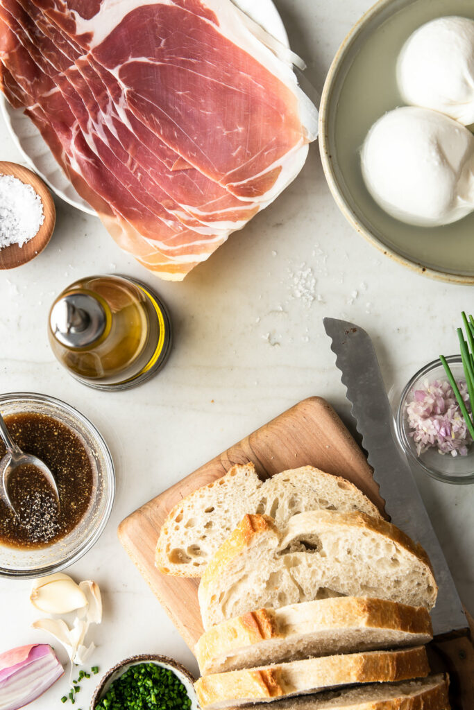 prosciutto, burrata, bread, chives, shallot, dijon, balsamic, lemon, olive oil