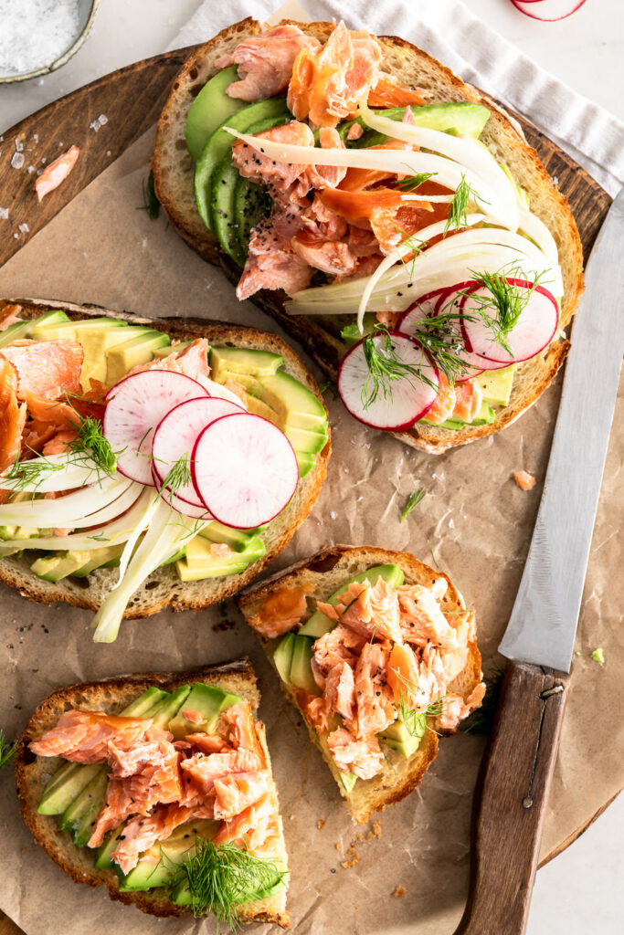 salmon avocado toast with pickled fennel