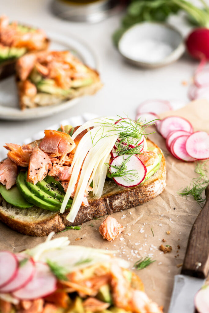 salmon toast with avocado and pickled fennel