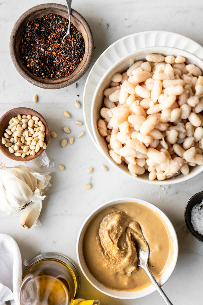white beans, tahini, spices, pine nuts, olive oil, garlic