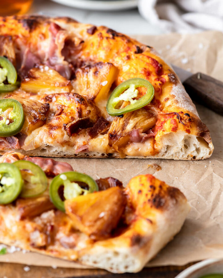 caramelized pineapple pizza with prosciutto, bacon and jalapeño peppers