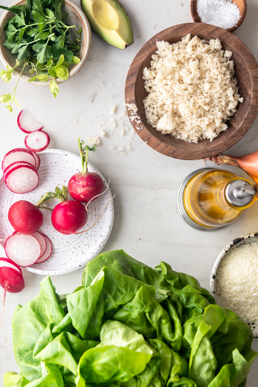 bibb lettuce, avocado, radishes, herbs, breadcrumbs, olive oil, pecorino