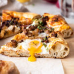 breakfast pizza recipe with eggs, sausage and onions